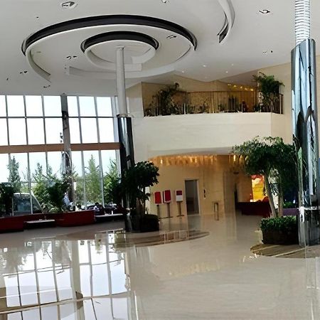 Hotel Ramada Plaza By Wyndham Hangzhou Riverside Esterno foto