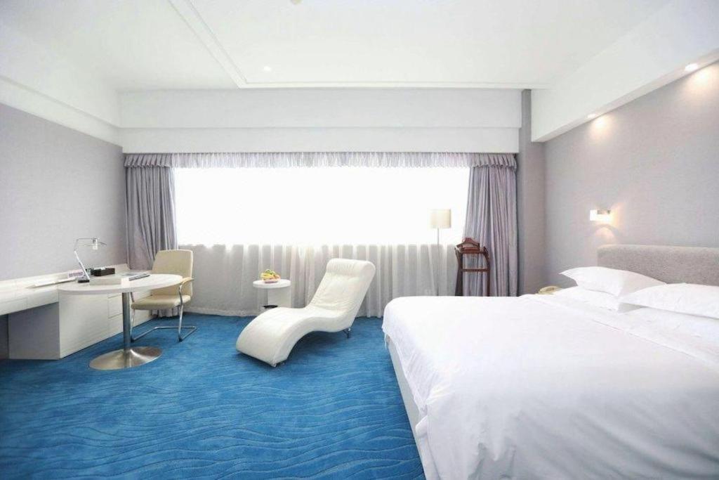 Ramada Plaza By Wyndham Hangzhou Riverside Esterno foto