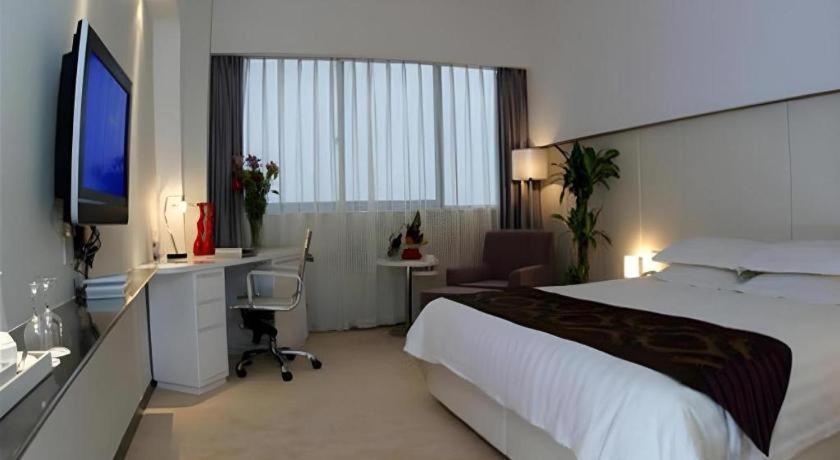 Ramada Plaza By Wyndham Hangzhou Riverside Esterno foto