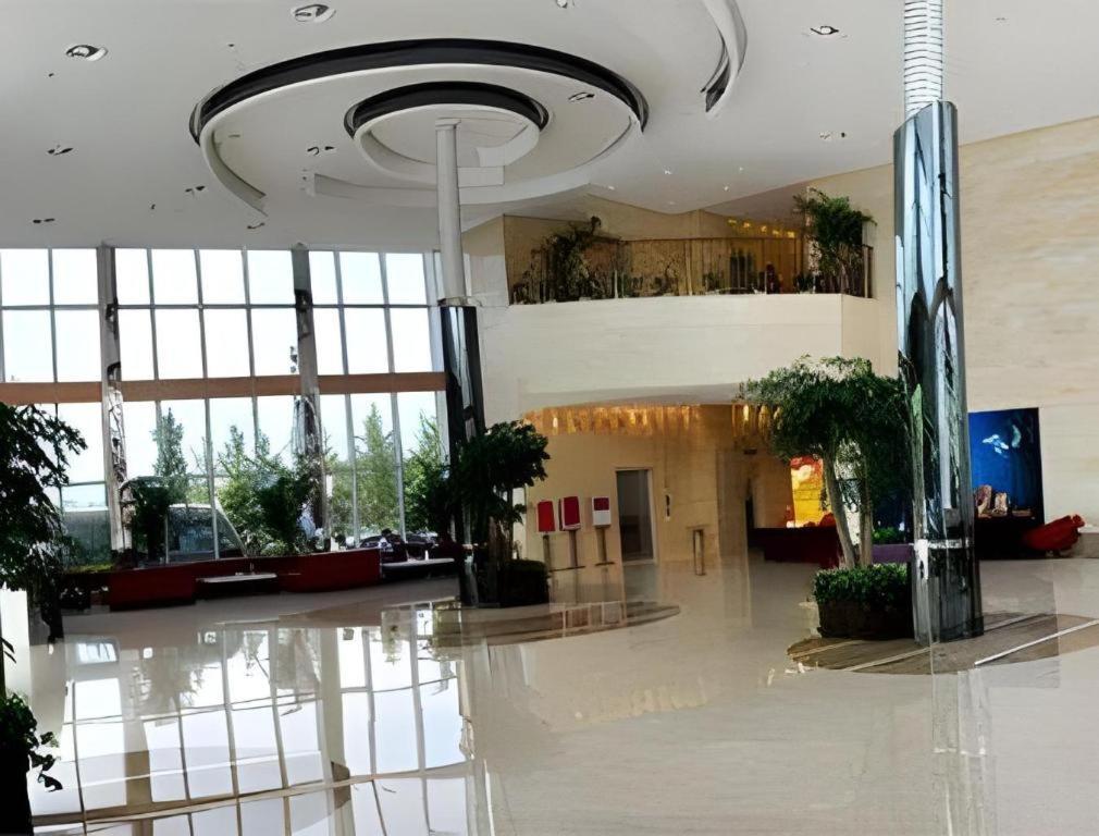 Ramada Plaza By Wyndham Hangzhou Riverside Esterno foto